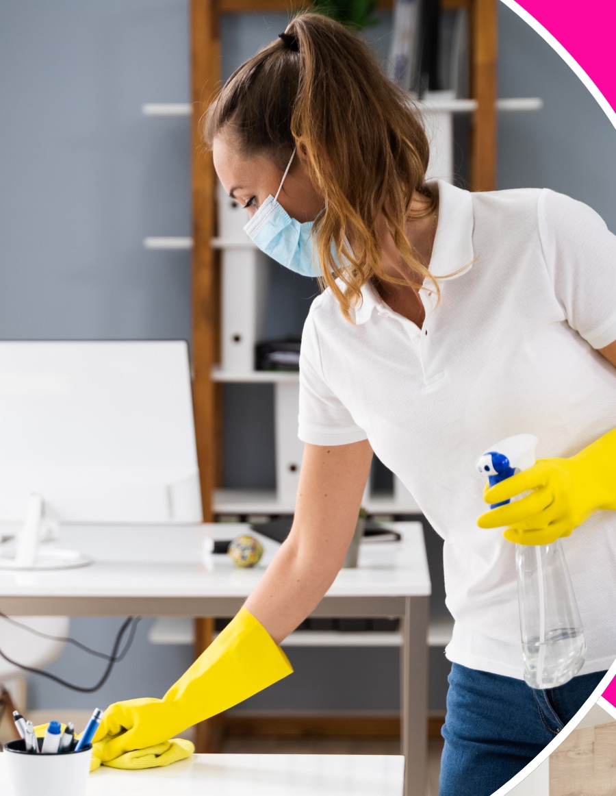 Rbasso's Clean team member cleaning a home office surface